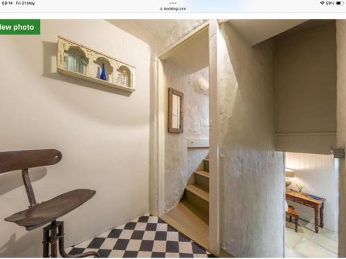 a home office with a desk and a chair at The Old Candle Shop in Little Walsingham