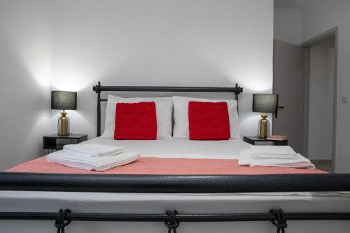 Ein Bett oder Betten in einem Zimmer der Unterkunft Leros Houses a Porto Lago