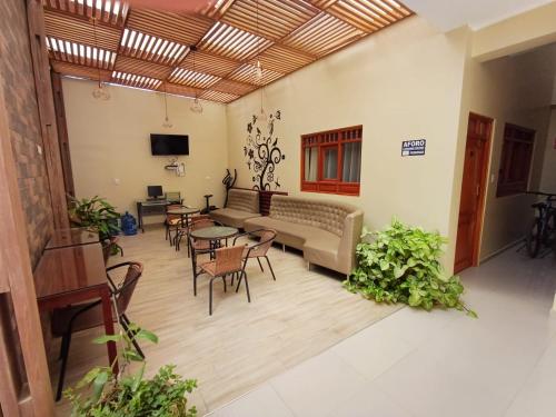 TV a/nebo společenská místnost v ubytování Arena Hostal