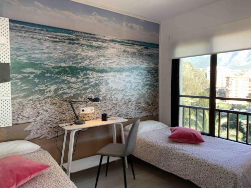 Postel nebo postele na pokoji v ubytování Apartamento Frontal Primera Linea