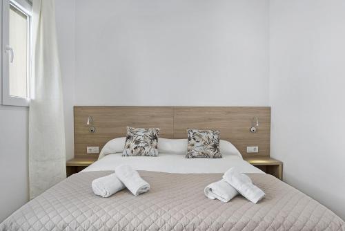 Postel nebo postele na pokoji v ubytování Apartamento Guzmán C