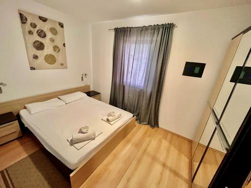 Voodi või voodid majutusasutuse Fineda Grande Apartments toas