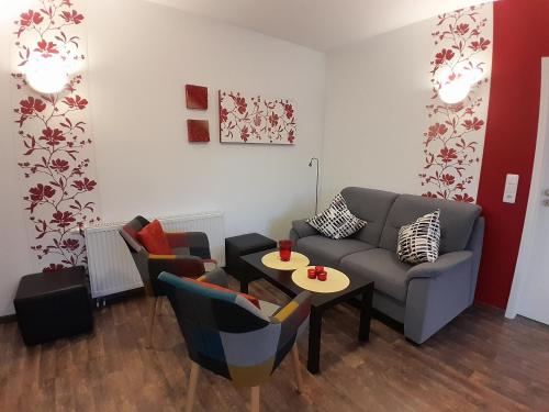 Ruang duduk di Ferienwohnung Wikingerland