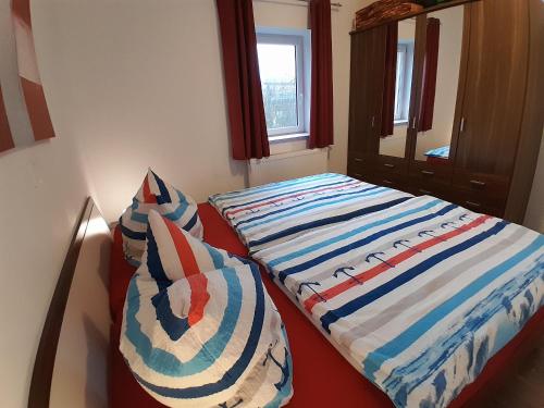 Katil atau katil-katil dalam bilik di Ferienwohnung Wikingerland