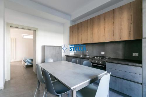 Kuchyň nebo kuchyňský kout v ubytování Condominio Trento