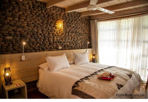 Postel nebo postele na pokoji v ubytování Terrantai Lodge