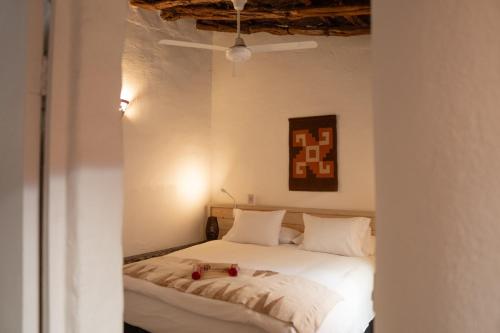 Postel nebo postele na pokoji v ubytování Terrantai Lodge