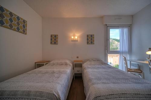 Postel nebo postele na pokoji v ubytování Hotel Coté Sud