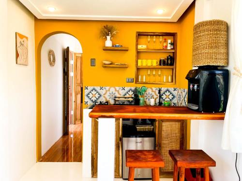 Η κουζίνα ή μικρή κουζίνα στο Cosy Villa & Apartments - Siargao