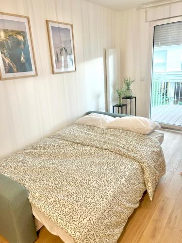 Postel nebo postele na pokoji v ubytování Appartement neuf et spacieux