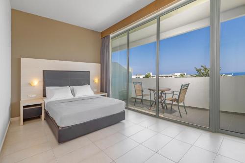 Кровать или кровати в номере Virginia Family Resort