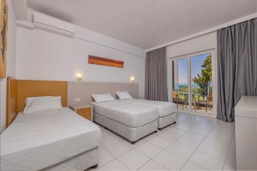 Кровать или кровати в номере Virginia Family Resort