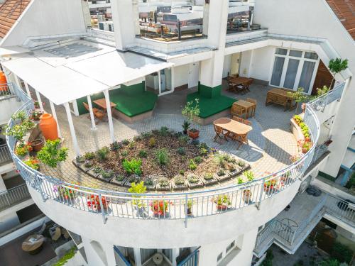 an overhead view of a courtyard in a building at Rooftop City Residence in Budapest