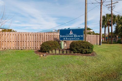 a sign for a santa margarita beach and resort club at Beach-Pool-Private Balcony in Tybee Island