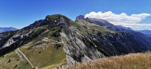 a mountain with a road on top of it at Le Galussel Gite d'étape et de séjour in Saint-Sébastien