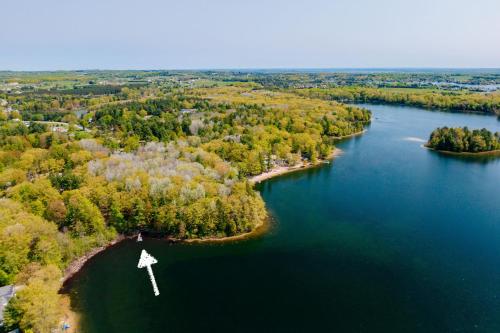 an island in the middle of a lake at Lake Front-fishing-all sports Bass Lake Sanctuary in Traverse City