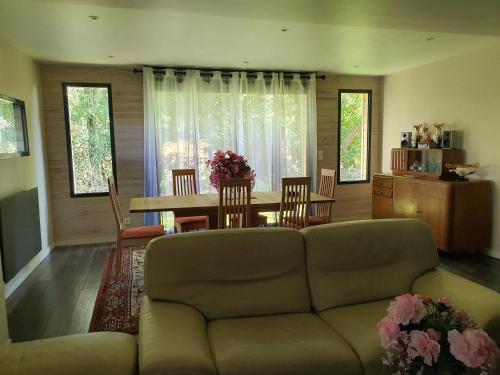 Χώρος καθιστικού στο Cottage agréable et chaleureux