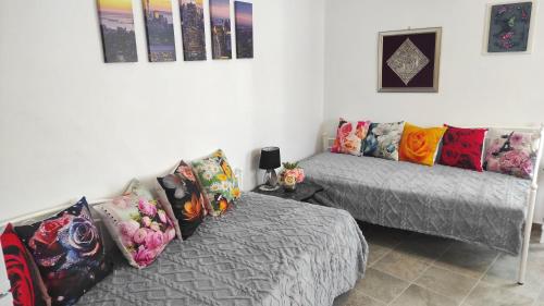 Katil atau katil-katil dalam bilik di Faros Sea View - Sifnos