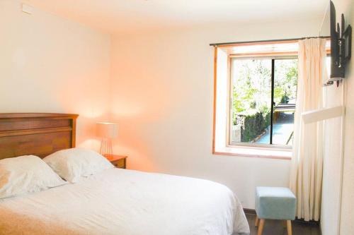 Φωτογραφία από το άλμπουμ του Lodge frente al lago con tina caliente privada σε Rapel