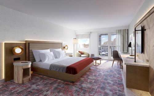 um quarto de hotel com uma cama e uma sala de estar em Hotel De Novo Springdale, Tapestry Collection by Hilton em Springdale