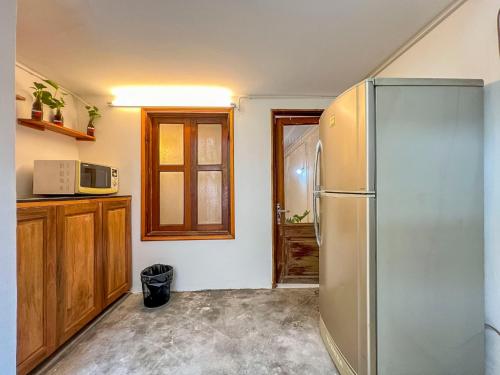 Kuchyň nebo kuchyňský kout v ubytování Bamboo Home