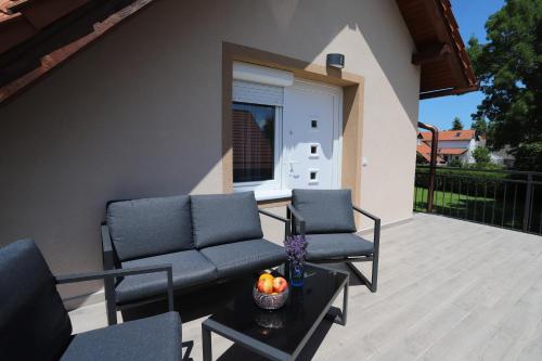 Posezení v ubytování Golden Apartman Balatonlelle