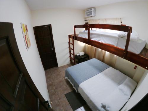 an overhead view of a bedroom with two bunk beds at Hotel Estación del Sol in Las Núñez