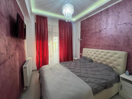 Postel nebo postele na pokoji v ubytování Zig Zag Apartament