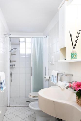 a bathroom with a shower and a sink and a toilet at MANSARDA CASA GABRIELLA in Cattolica