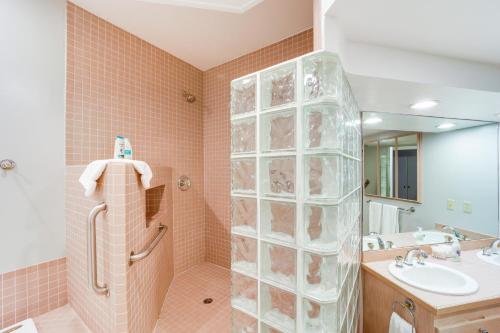 a bathroom with a shower and a sink at Beautiful Condo with Balcony on Lake Chelan! in Chelan