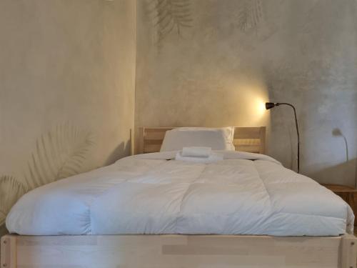 Postel nebo postele na pokoji v ubytování Wiki Hostel Colive