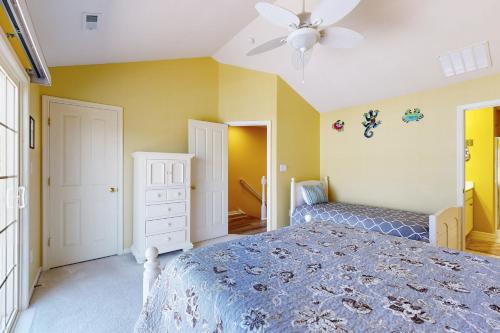 a bedroom with a bed and a ceiling fan at Rehoboth Crossing 19915 Ames Dr in Rehoboth Beach