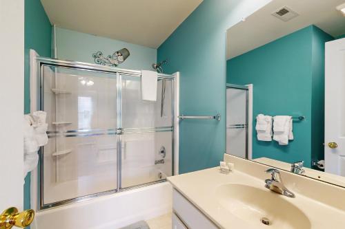 a bathroom with a shower and a sink at Rehoboth Crossing 19915 Ames Dr in Rehoboth Beach