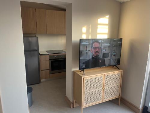 En TV eller et underholdningssystem på Apartments Smiljanic