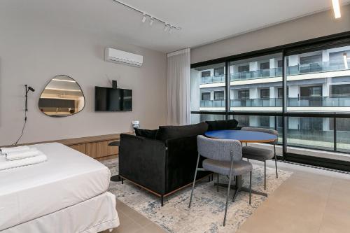 Ένα ή περισσότερα κρεβάτια σε δωμάτιο στο Piscina no Rooftop com Vista Mar | Foodhall | WI-FI 200MB #TopTower