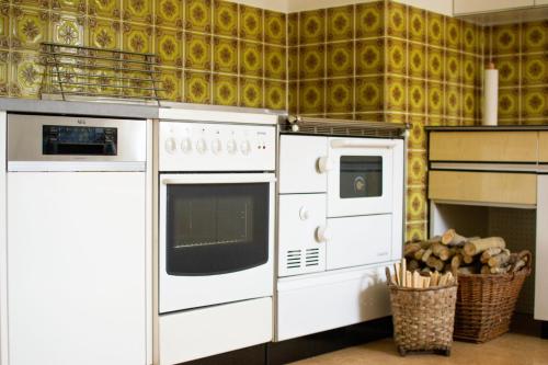 Kuchyň nebo kuchyňský kout v ubytování Ferienhaus Koglegg