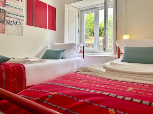 Postel nebo postele na pokoji v ubytování Eighteen21 Houses - Casa da Mula in Quinta Velha