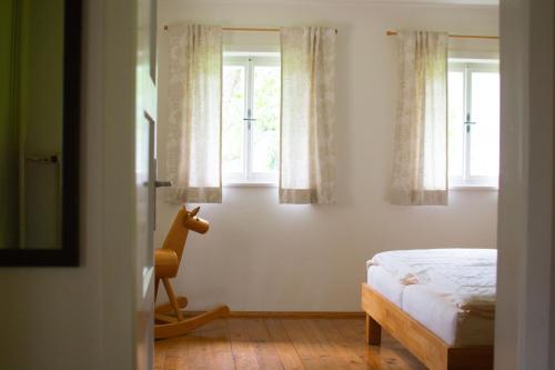 Postel nebo postele na pokoji v ubytování Ferienhaus Koglegg