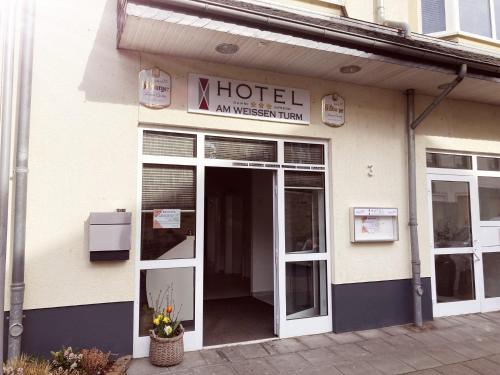 a hotel with the door open on a building at Hotel Am Weißen Turm in Bad Neuenahr-Ahrweiler