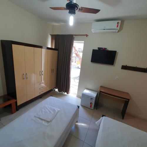 Katil atau katil-katil dalam bilik di Hotel Muriaé