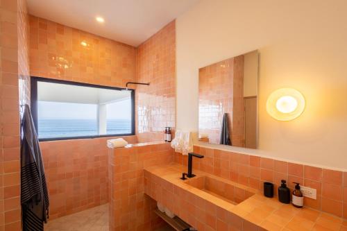 Koupelna v ubytování Cabo Break Hotel