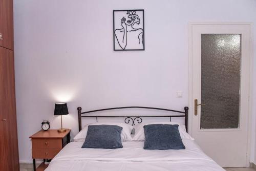 Postel nebo postele na pokoji v ubytování Sotiris Apartment
