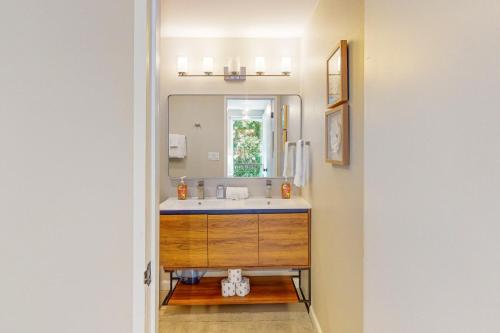 a bathroom with a sink and a mirror at Morning Star Retreat in Vashon