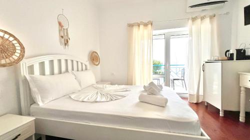 Postel nebo postele na pokoji v ubytování Las Nubes Rooms