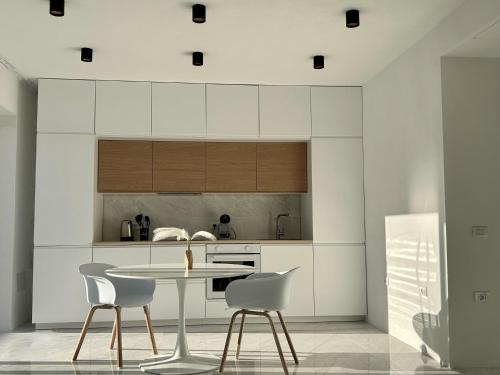 Kuchyň nebo kuchyňský kout v ubytování Smart Luxury Suites & Apartments