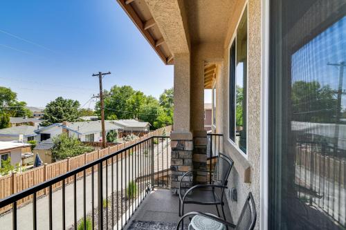 a balcony with a chair and a view of a city at 16 Mi to Lake Tahoe Carson City Townhome in Carson City