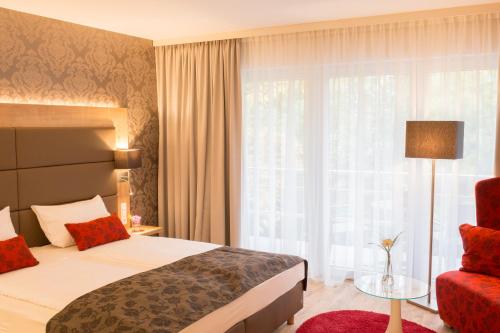 Una cama o camas en una habitación de DasSchaffers - MeinWohlfühlhotel