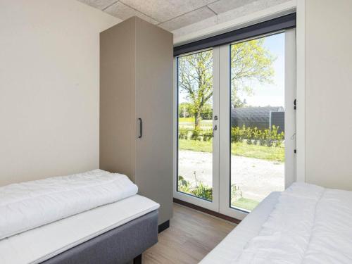 Кровать или кровати в номере Holiday home Skjern XI