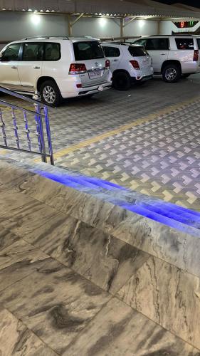 a parking lot with cars parked in a parking garage at إطلالة السيب للشقق المخدومة Itlalat Alseeb Serviced Apartments in Al Khafji