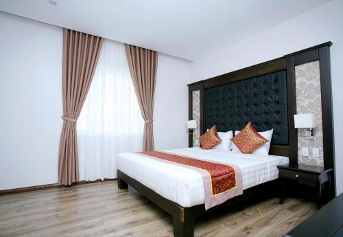 Katil atau katil-katil dalam bilik di Ha Long Park Hotel